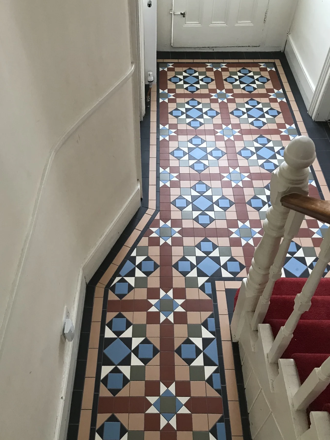 Intricate Victorian hallway floor tiling by Tom Timlin